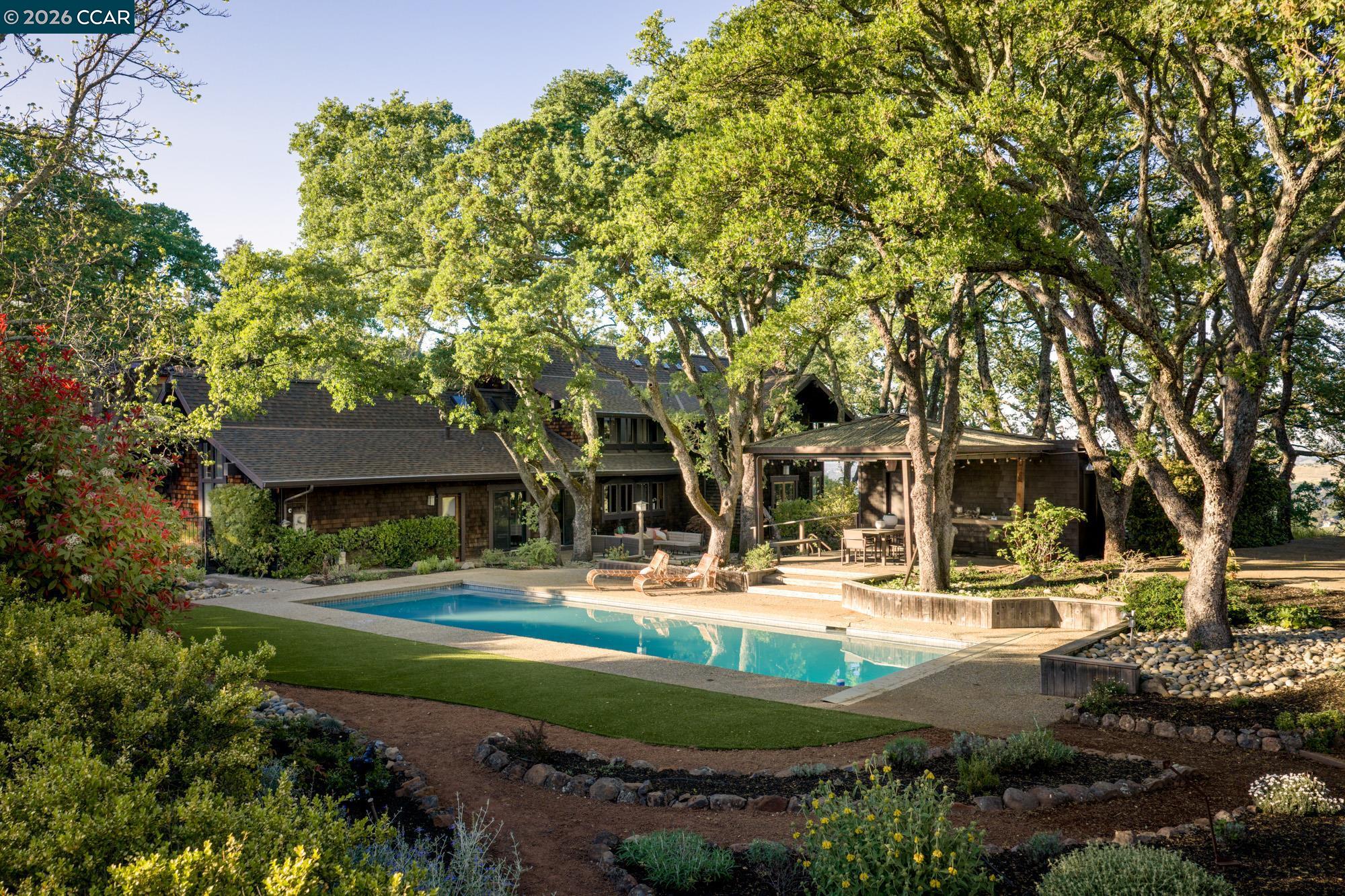 289 Castle Crest Road Alamo, CA 94507 - Photo 47 of 57 a view of a house with yard and trees