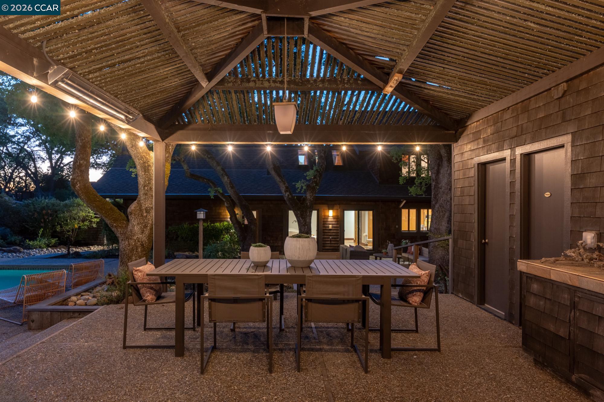 289 Castle Crest Road Alamo, CA 94507 - Photo 53 of 57 a view of a chairs and table in a patio
