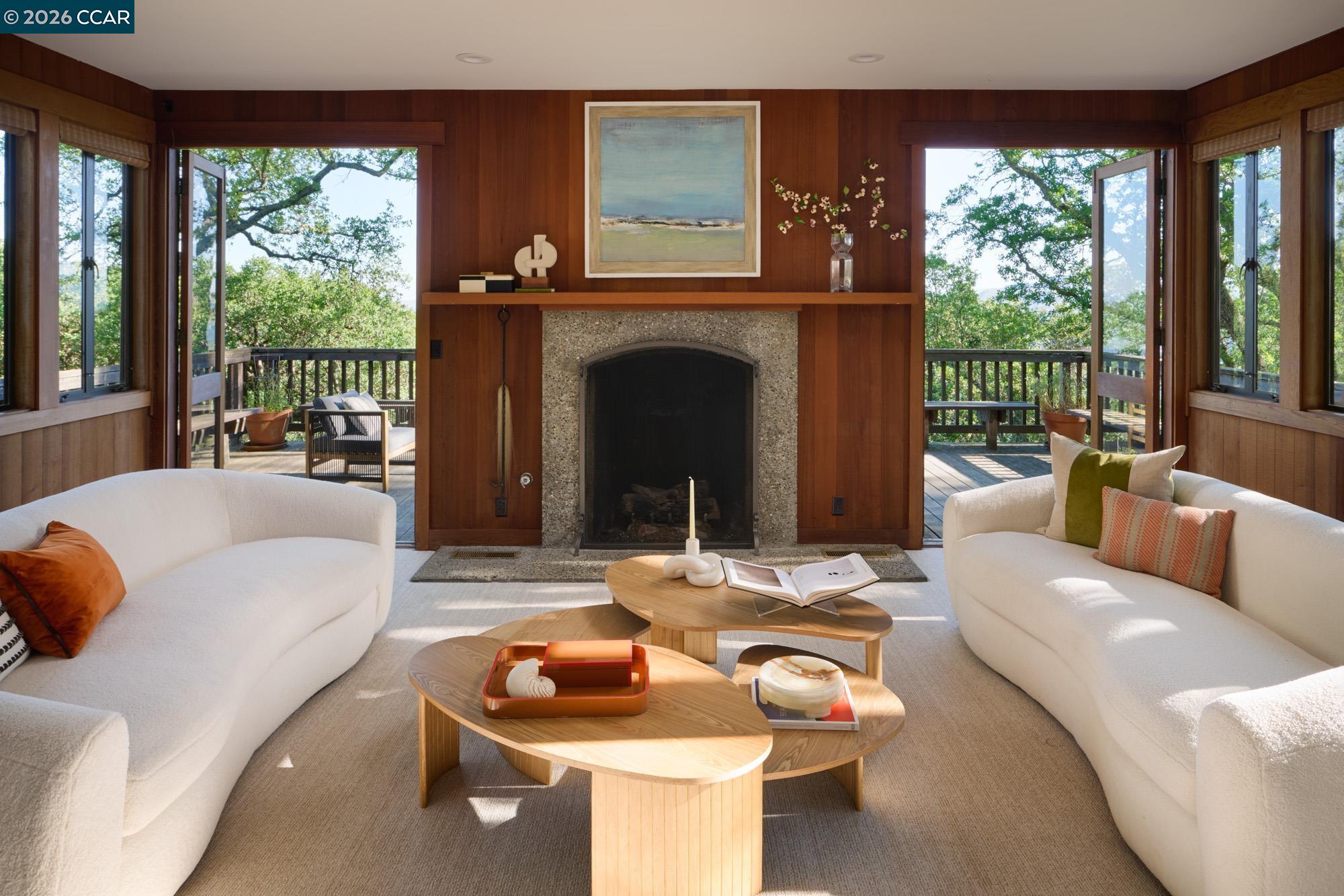 289 Castle Crest Road Alamo, CA 94507 - Photo 9 of 57 a living room with furniture and a fireplace