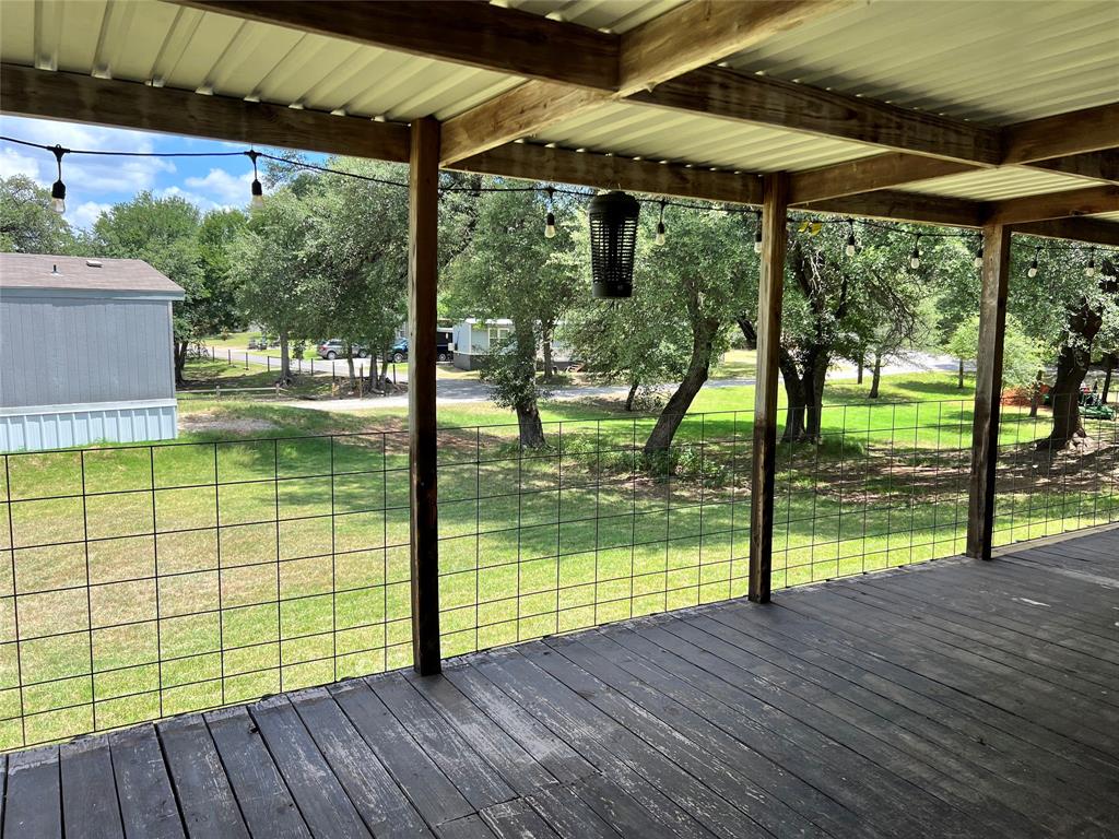 2334 San Bar Road, Unit 46 Graford, TX 76449 - Photo 26 of 37 a view of outdoor space with deck