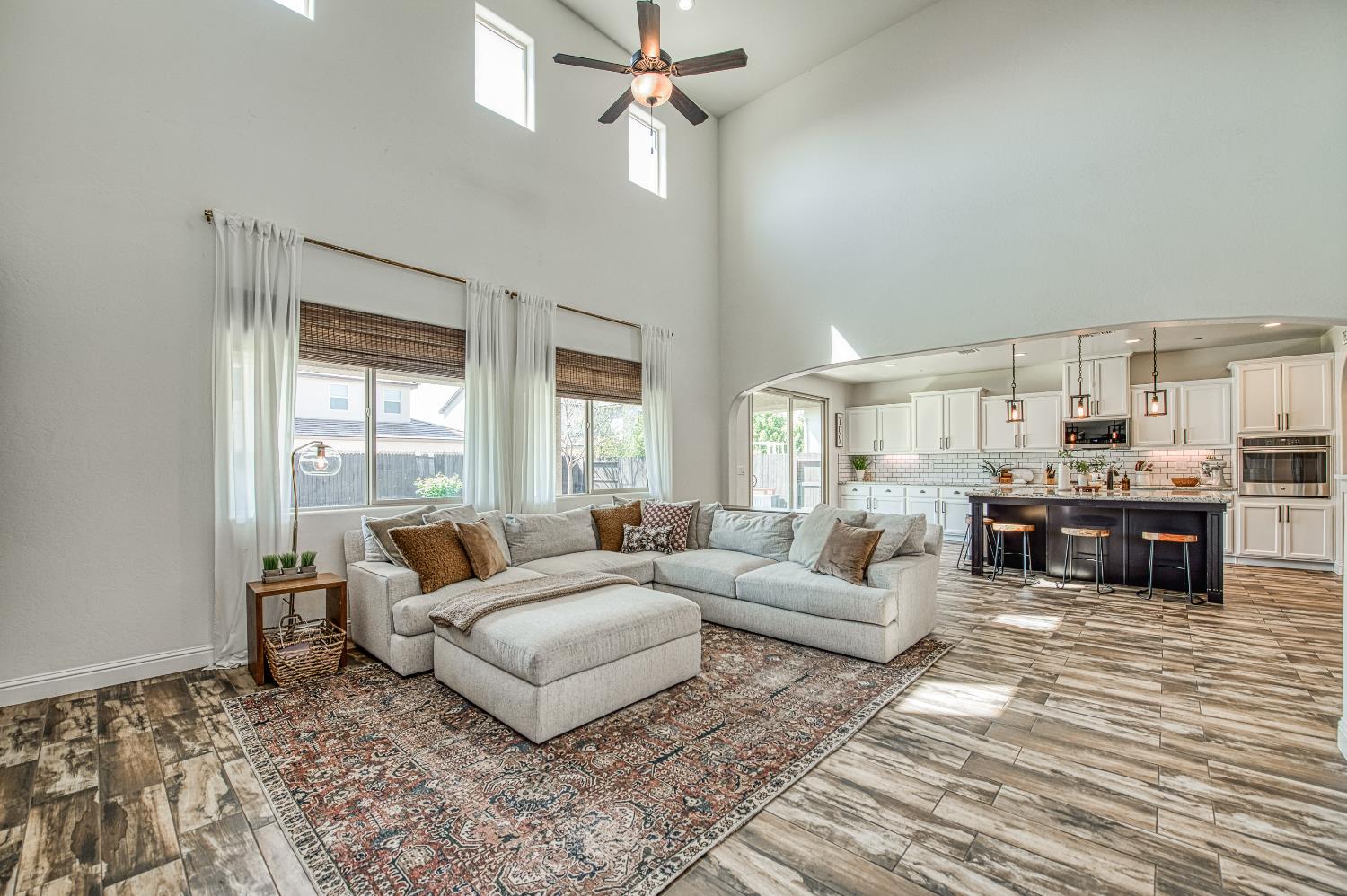 753 East Aretha Avenue Fowler, CA 93625 - Photo 26 of 61 a living room with furniture and view of kitchen