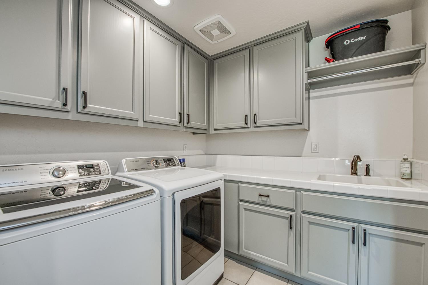 753 East Aretha Avenue Fowler, CA 93625 - Photo 28 of 61 a kitchen with stainless steel appliances granite countertop a sink a stove and cabinets