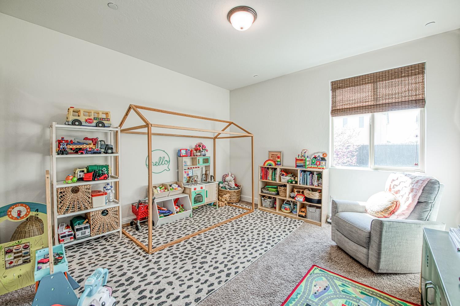 753 East Aretha Avenue Fowler, CA 93625 - Photo 29 of 61 a bedroom with furniture and a book shelf