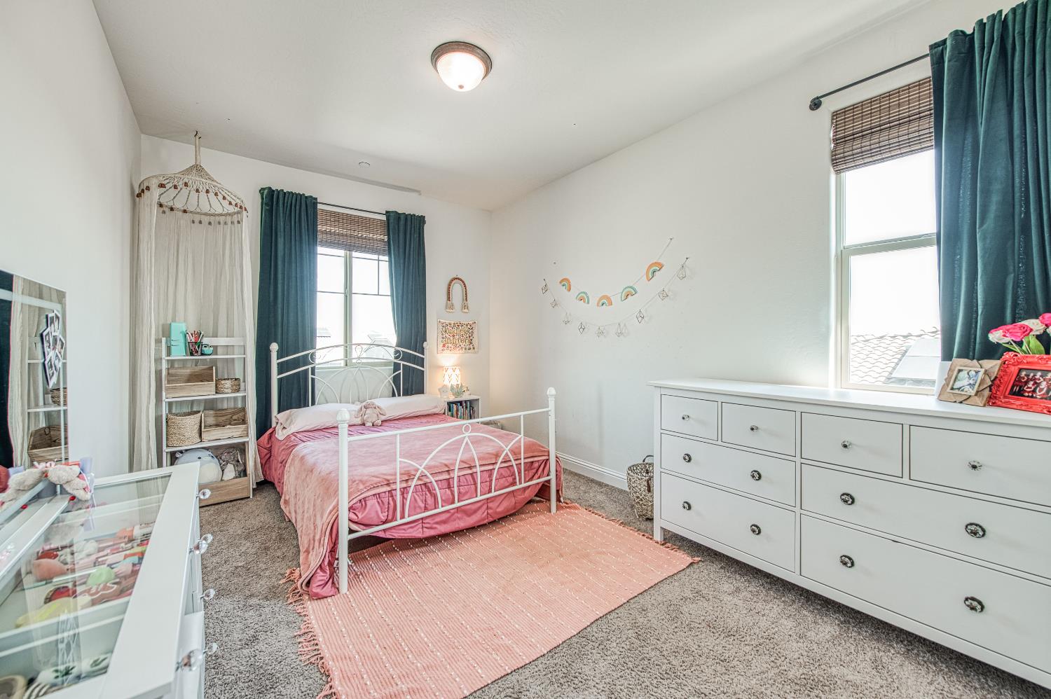 753 East Aretha Avenue Fowler, CA 93625 - Photo 41 of 61 a bedroom with a bed a window and dresser