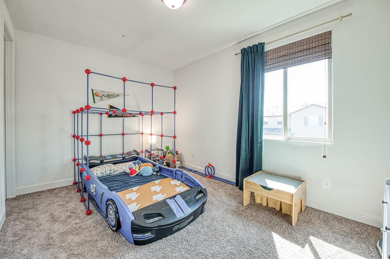 753 East Aretha Avenue Fowler, CA 93625 - Photo 44 of 61 a bedroom with furniture and a window