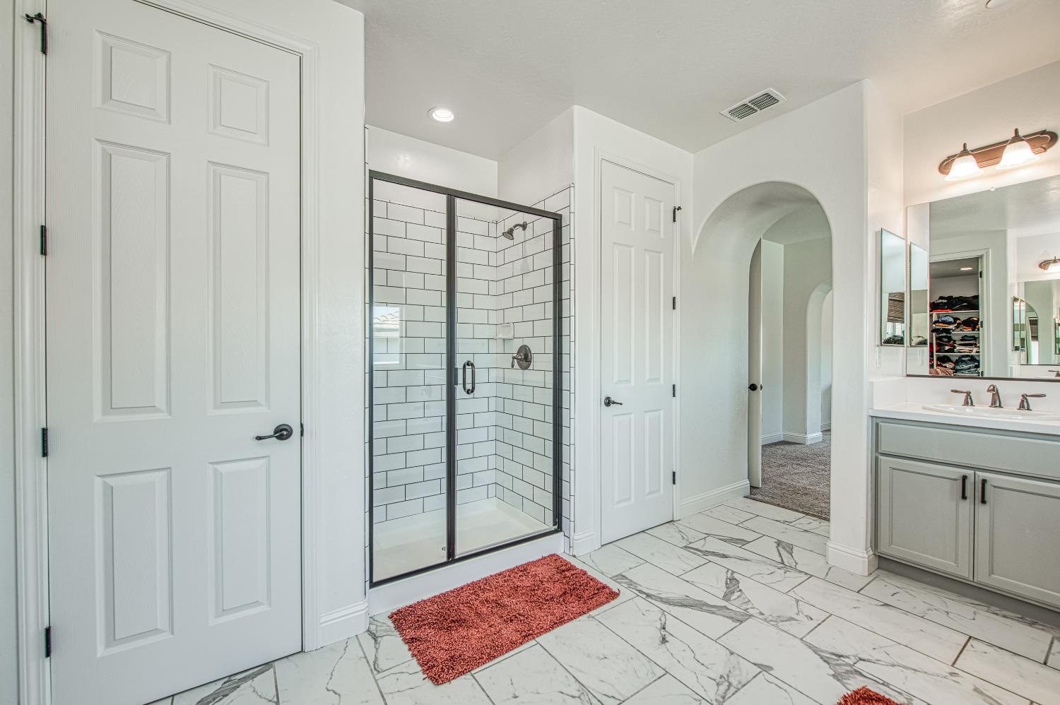 753 East Aretha Avenue Fowler, CA 93625 - Photo 49 of 61 a spacious bathroom with a shower and a sink
