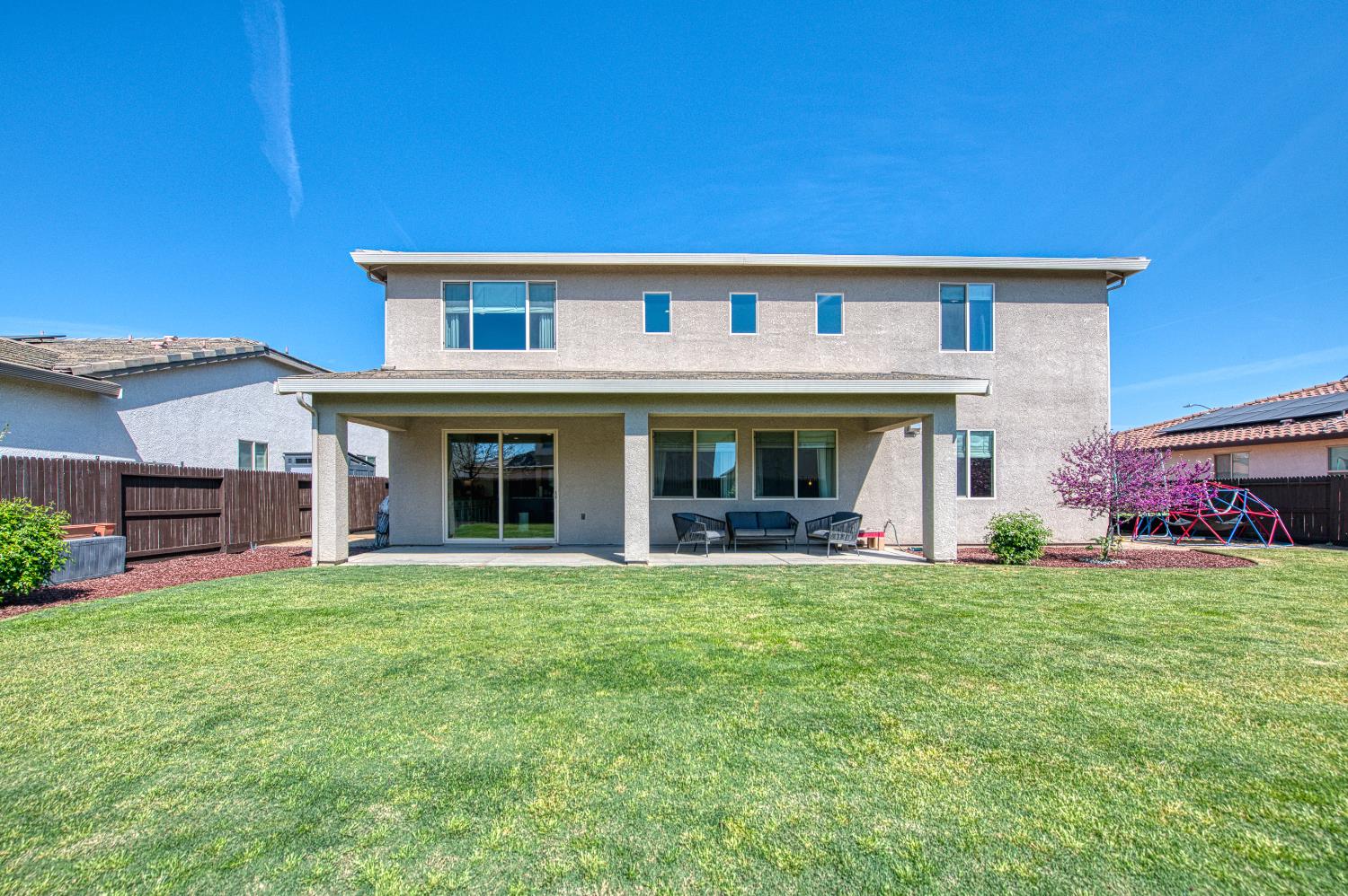 753 East Aretha Avenue Fowler, CA 93625 - Photo 56 of 61 a view of a house with a yard and sitting area