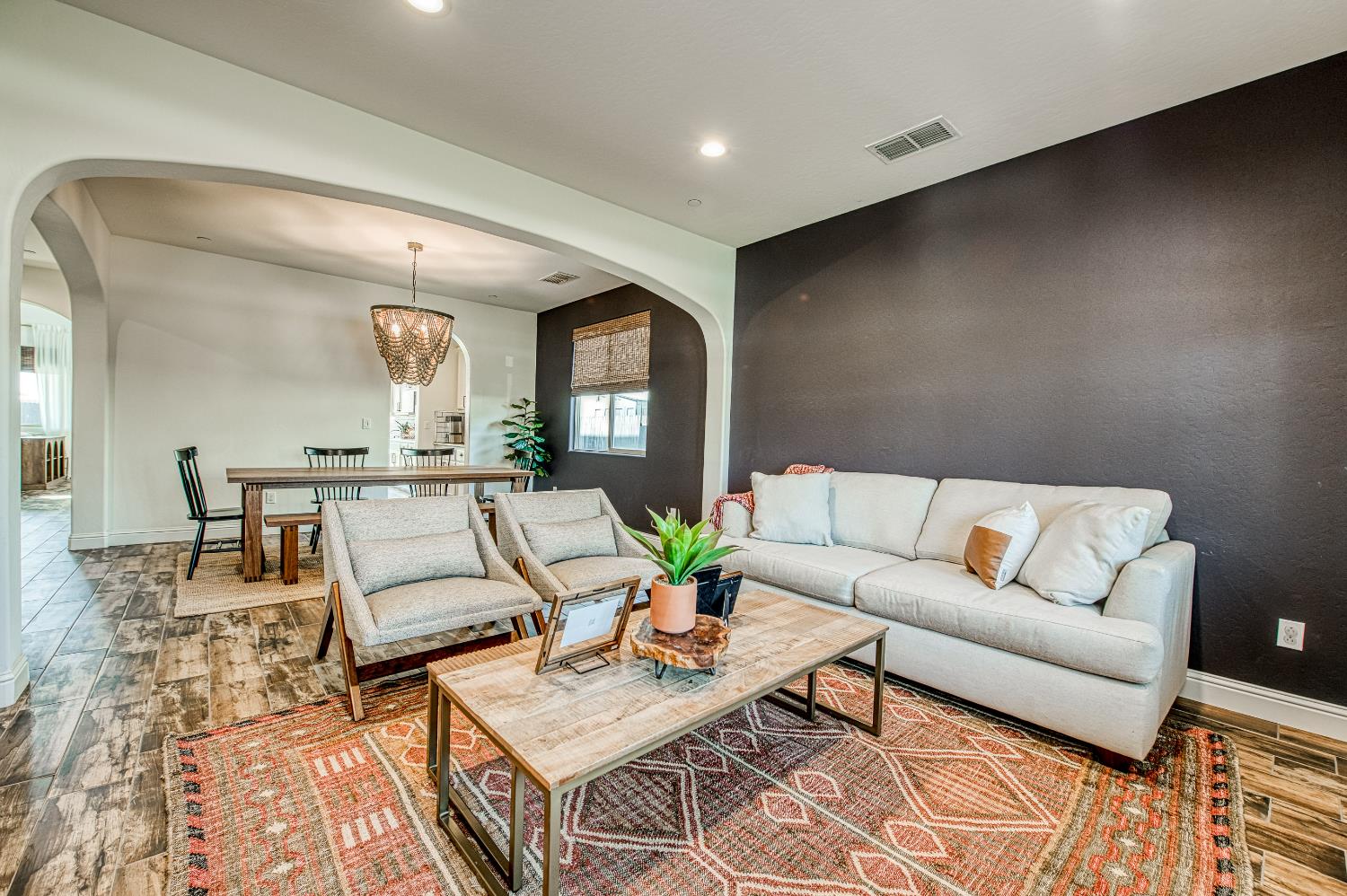 753 East Aretha Avenue Fowler, CA 93625 - Photo 8 of 61 a living room with furniture and wooden floor