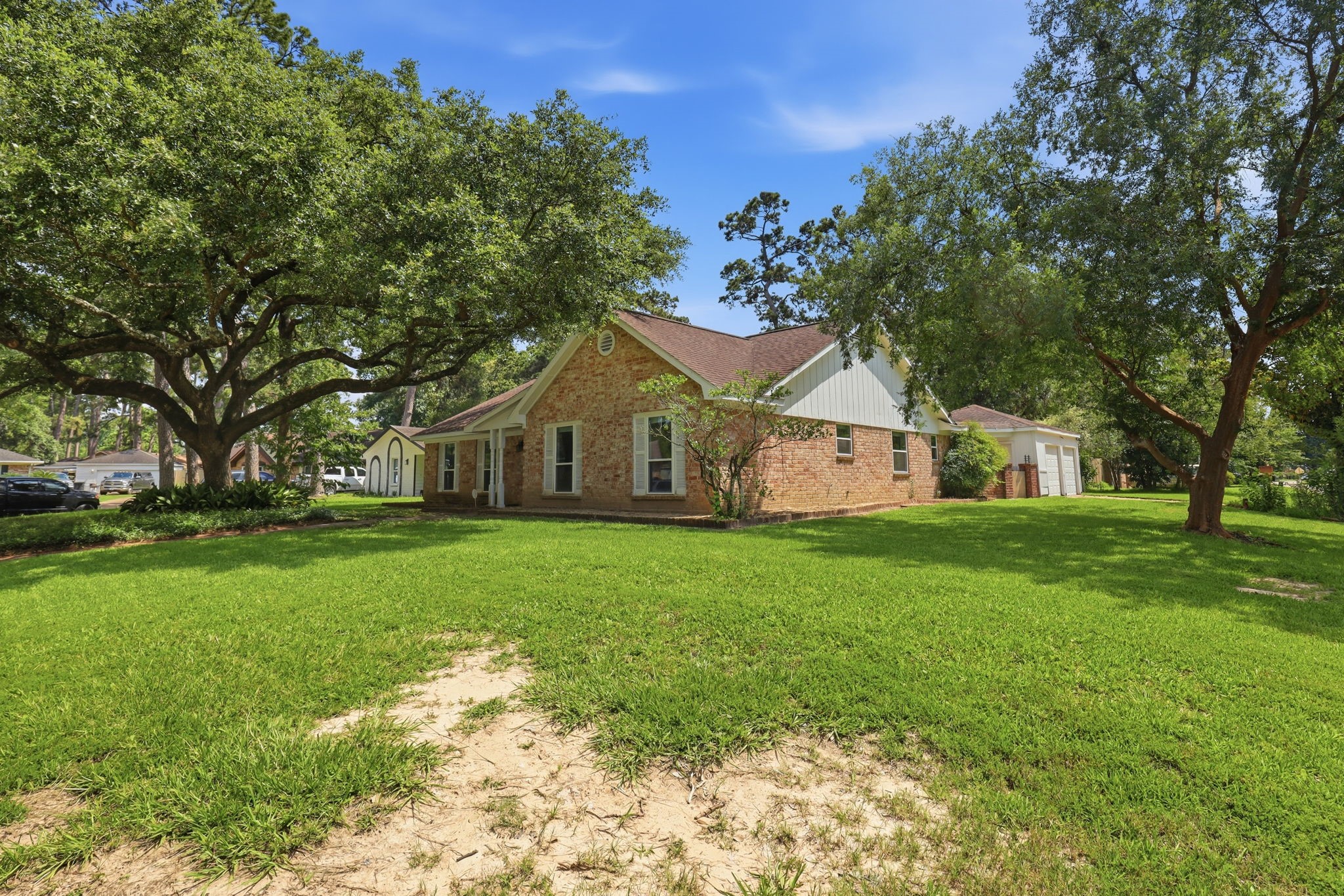25415 Friar Lake Lane Spring, TX 77373 - Photo 29 of 29 Large Front Lawn Beneath Mature Shade Trees