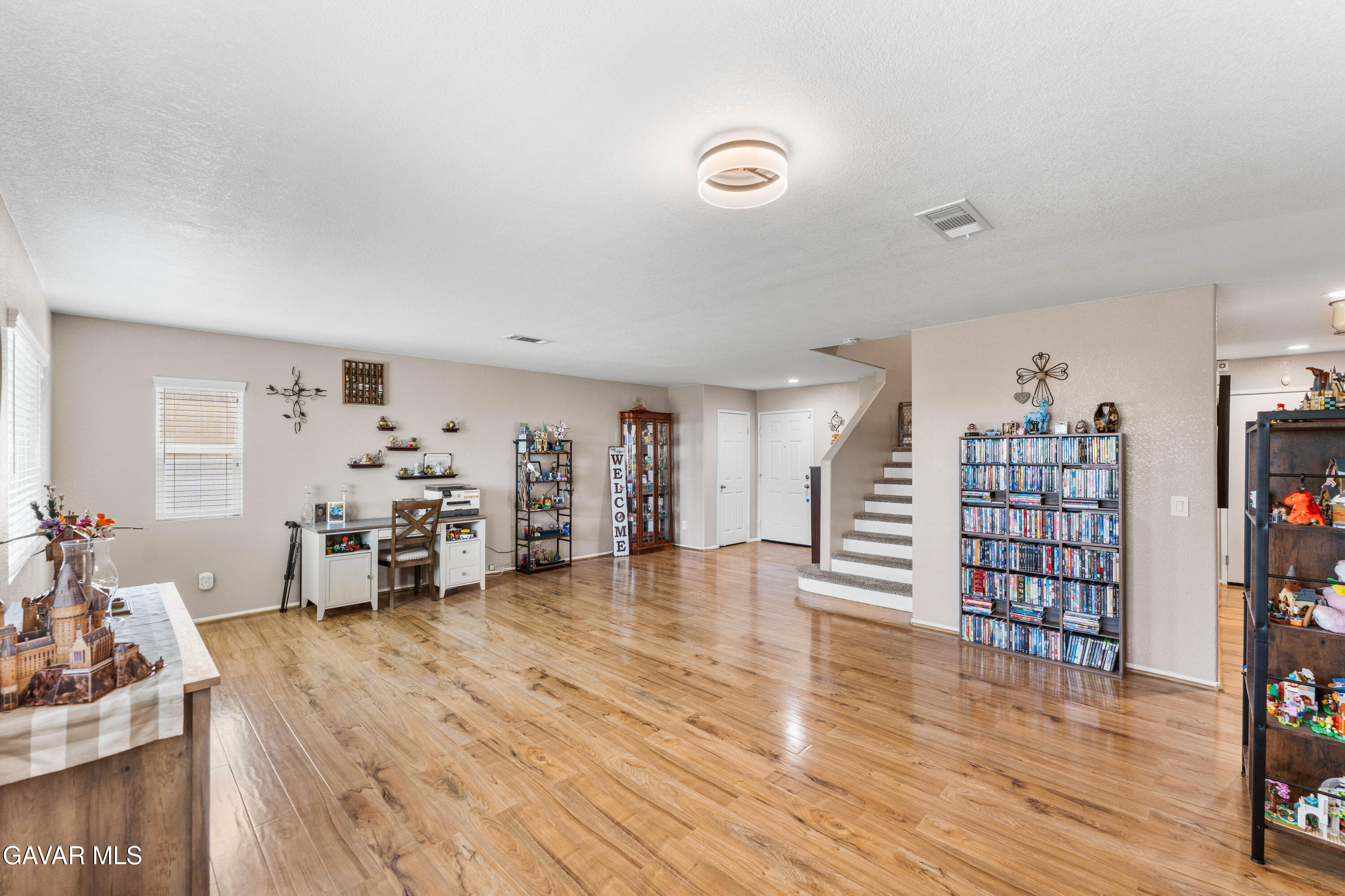 45448 Spahn Lane Lancaster, CA 93535 - Photo 17 of 49 a view of a livingroom with furniture and wooden floor