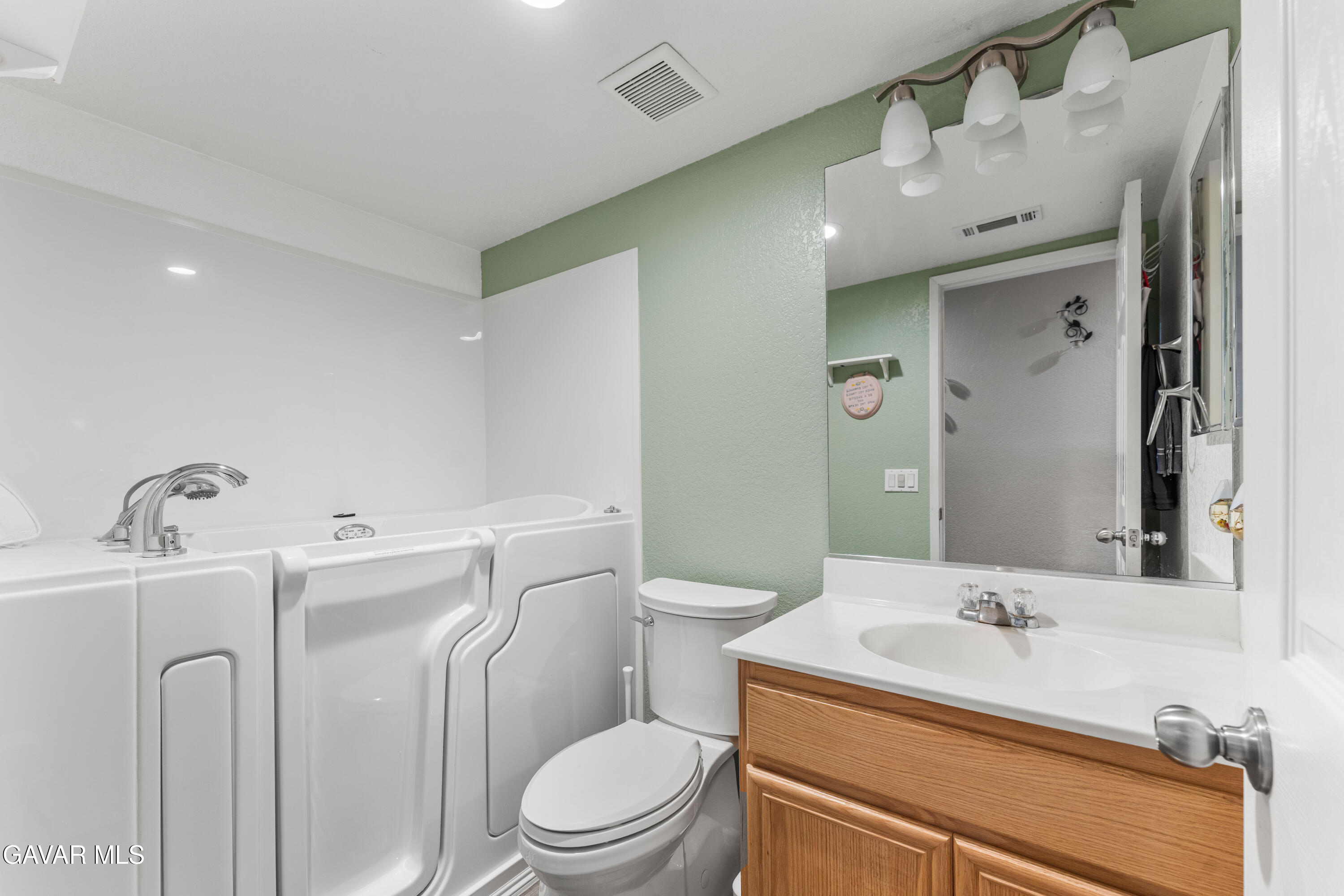 45448 Spahn Lane Lancaster, CA 93535 - Photo 21 of 49 a bathroom with a sink a toilet and shower