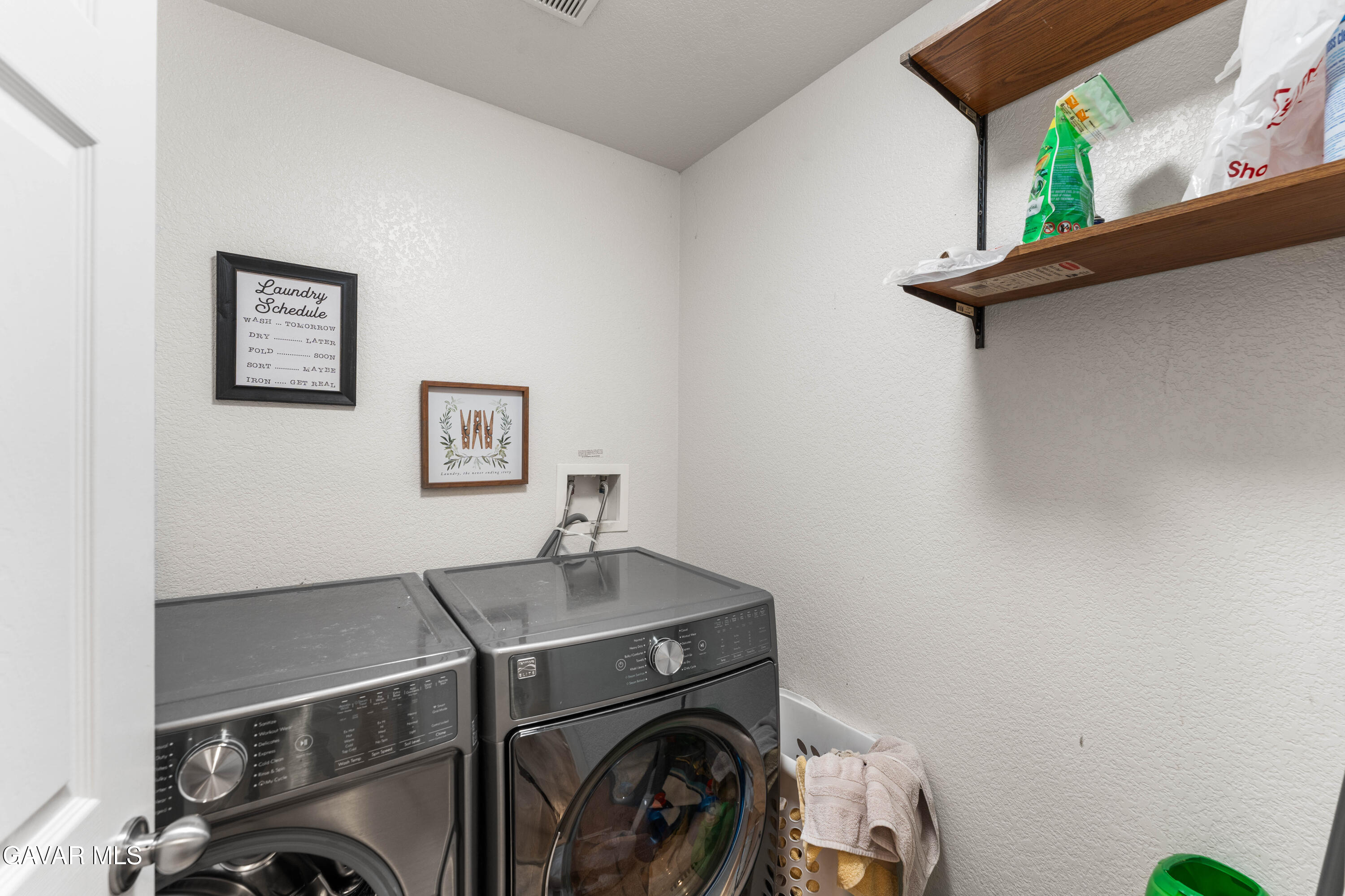 45448 Spahn Lane Lancaster, CA 93535 - Photo 28 of 49 a utility room with dryer and washer