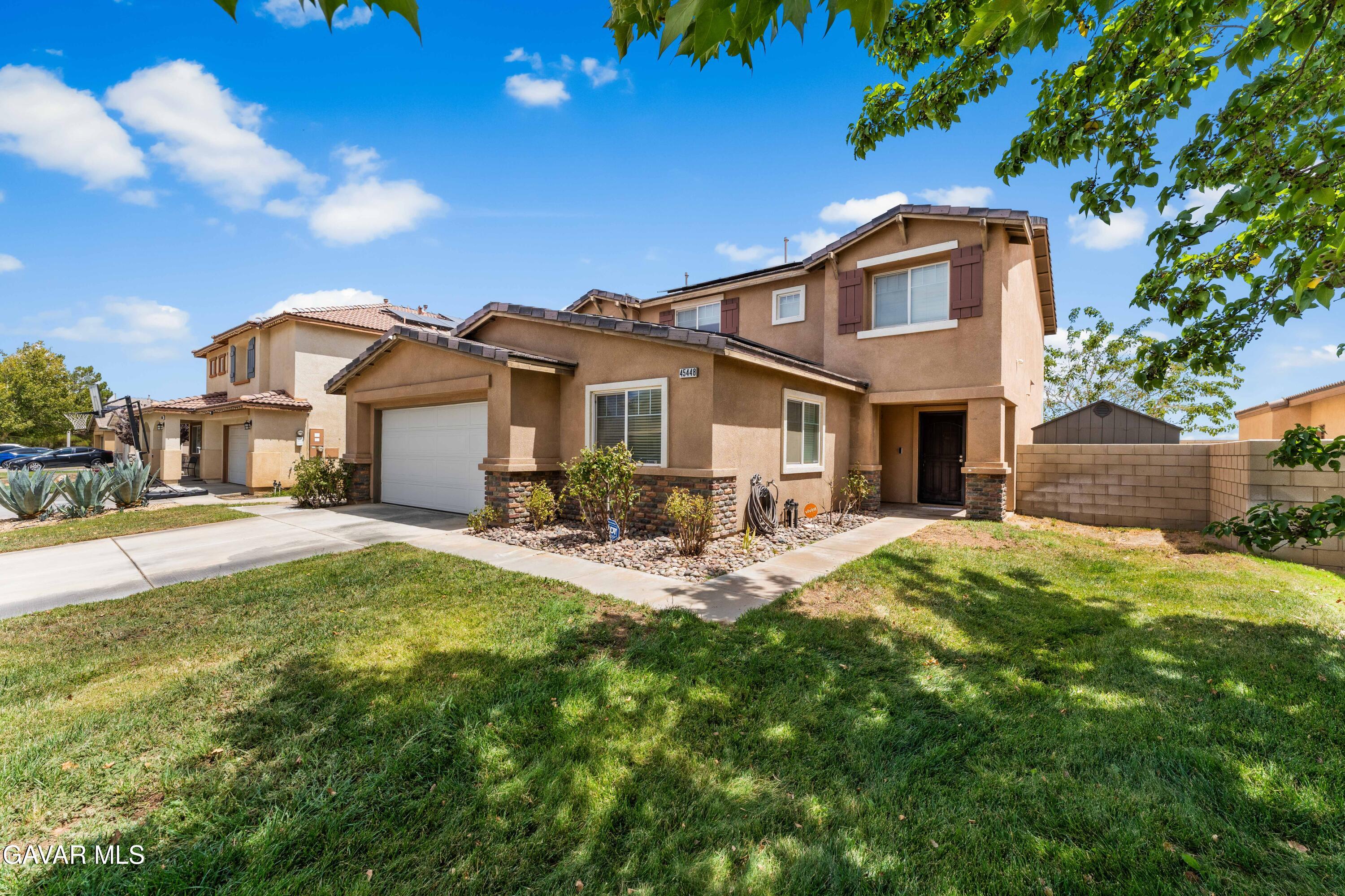 45448 Spahn Lane Lancaster, CA 93535 - Photo 40 of 49 a view of a yard in front of house
