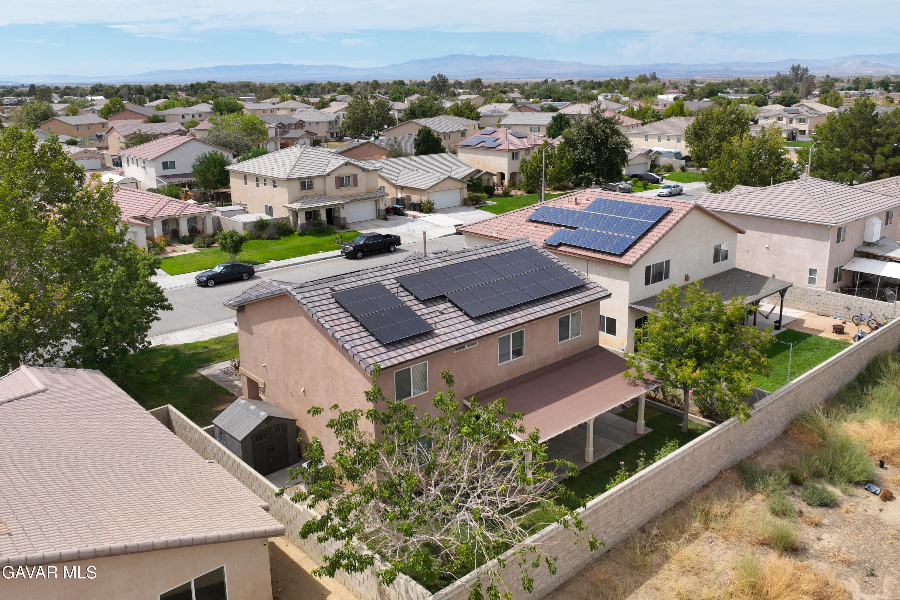 45448 Spahn Lane Lancaster, CA 93535 - Photo 42 of 49 an aerial view of multiple houses with a yard