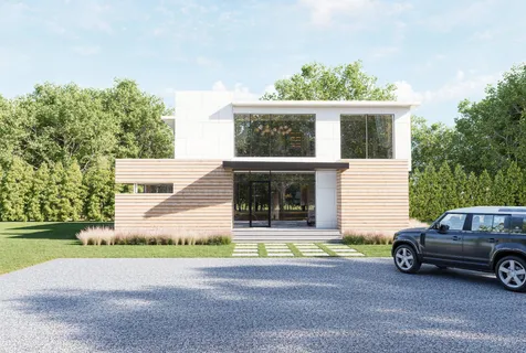 a view of a car parked in front of a house