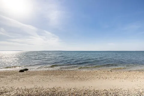 a view of beach and ocean