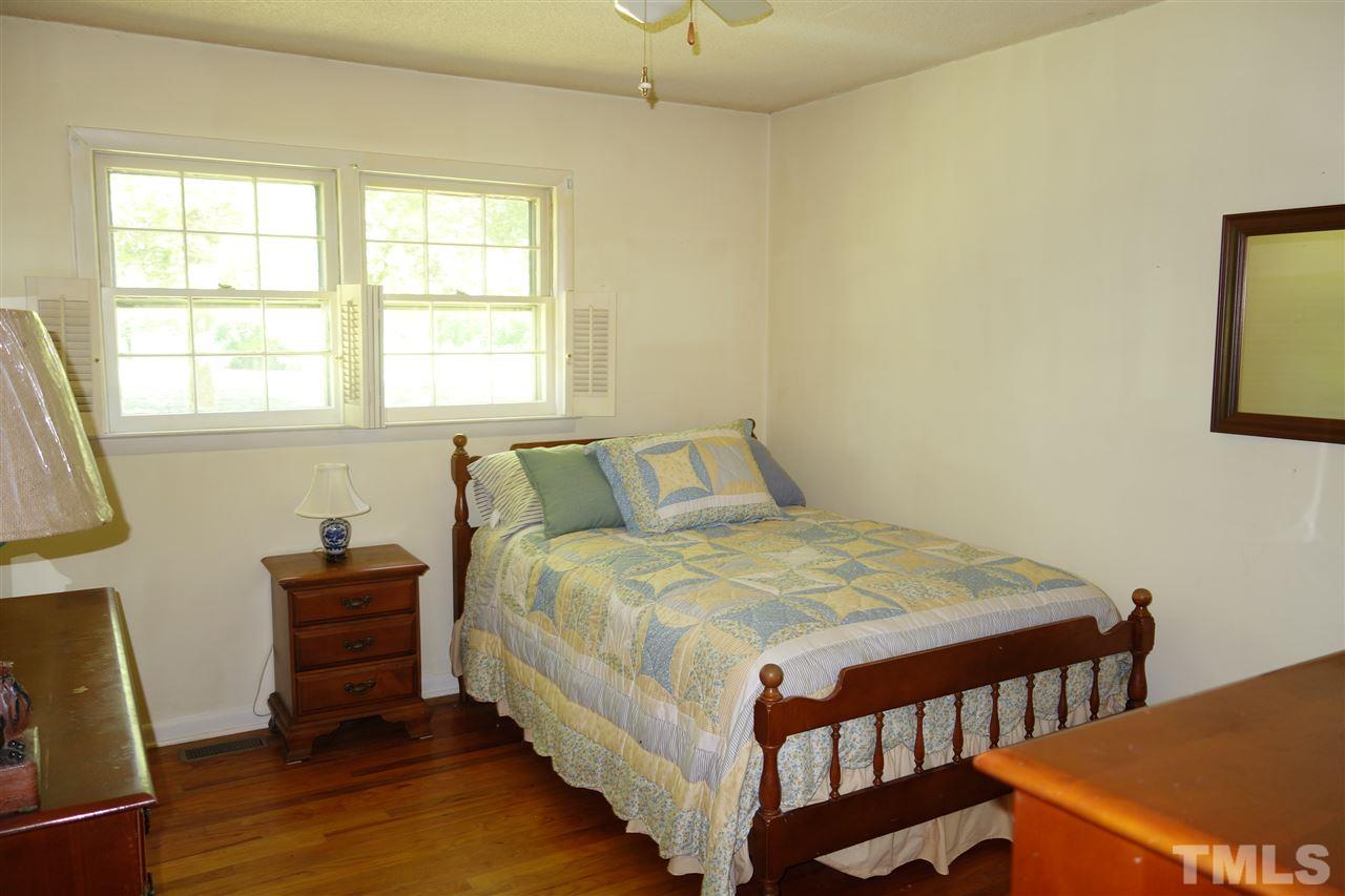 4444 Glebe Road Henderson, NC 27537 - Photo 12 of 19 Hardwood floor in the bedroom