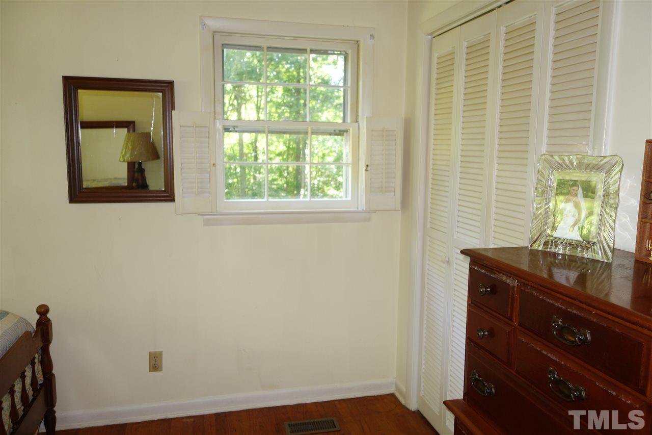 4444 Glebe Road Henderson, NC 27537 - Photo 14 of 19 One of the bedrooms with hardwood floor