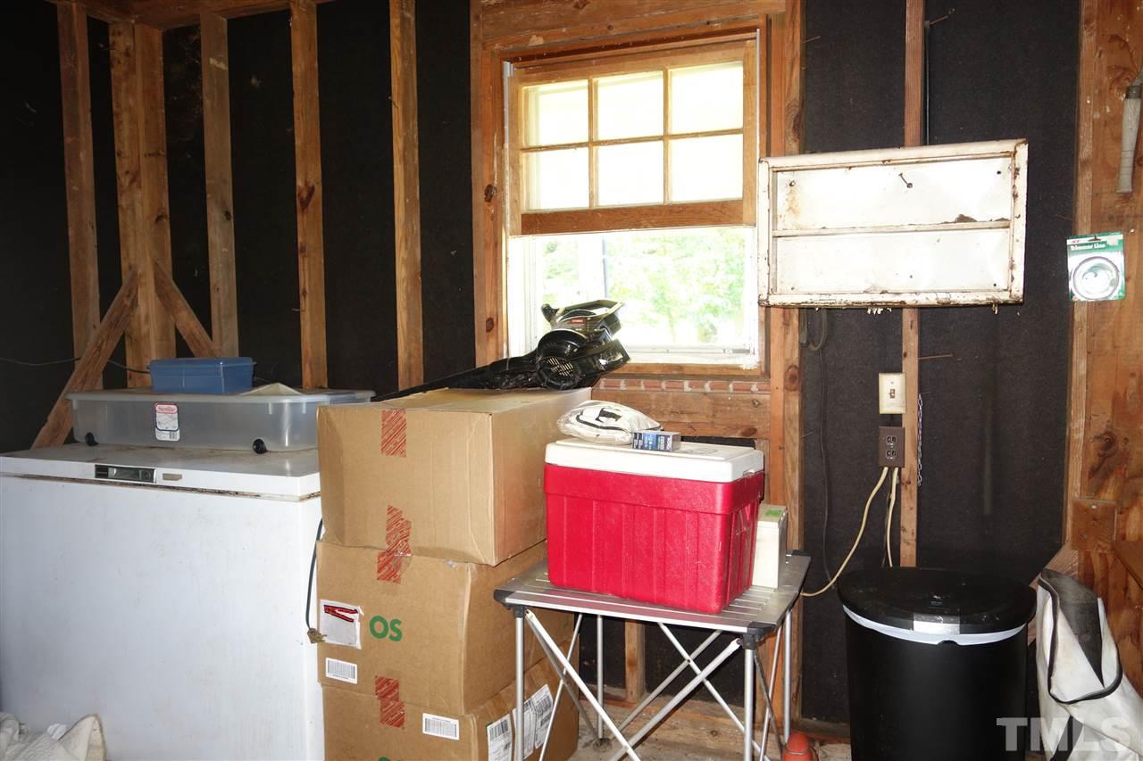 4444 Glebe Road Henderson, NC 27537 - Photo 16 of 19 Storage room at the back of the carport