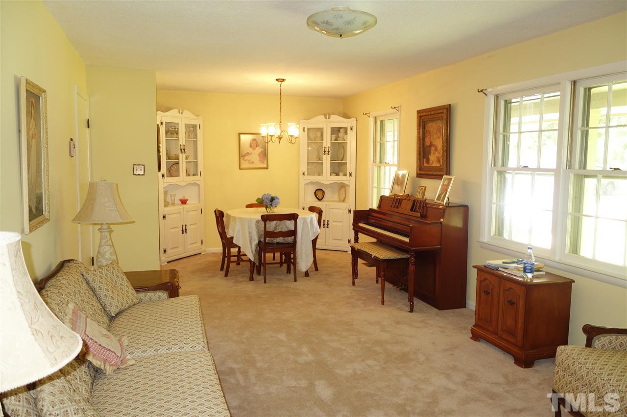 4444 Glebe Road Henderson, NC 27537 - Photo 3 of 19 Spacious living room with the dining area