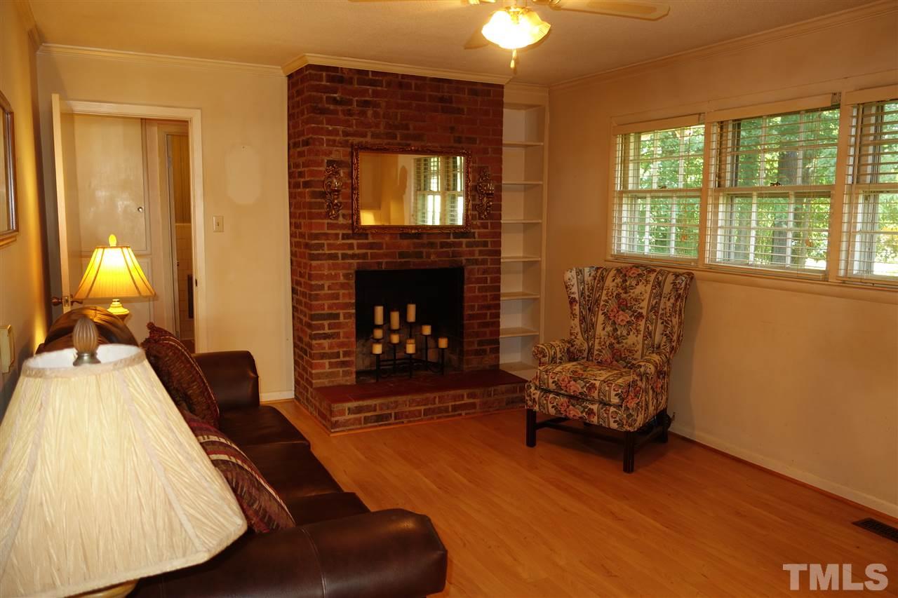 4444 Glebe Road Henderson, NC 27537 - Photo 5 of 19 Family room with laminate flooring