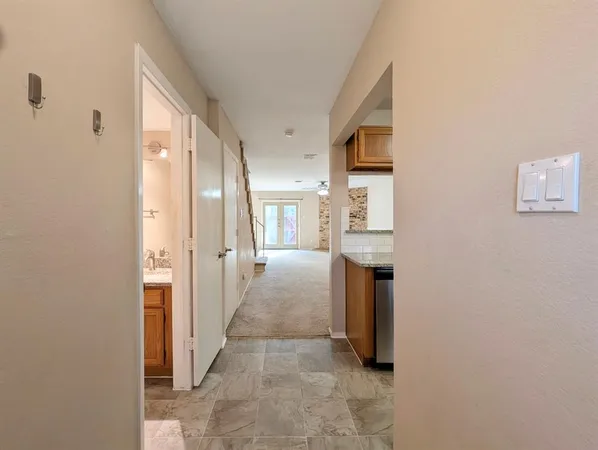a view of hallway with stairs