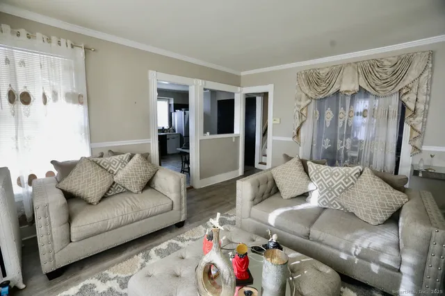 a living room with furniture and a couch