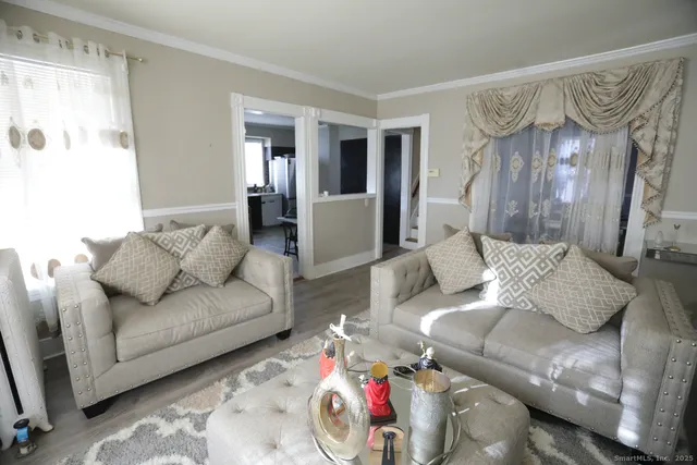 a living room with furniture and a couch