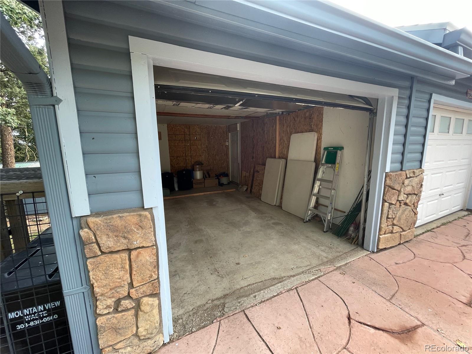 11948 Apache Trail Conifer, CO 80433 - Photo 26 of 45 a view of front door and bedroom