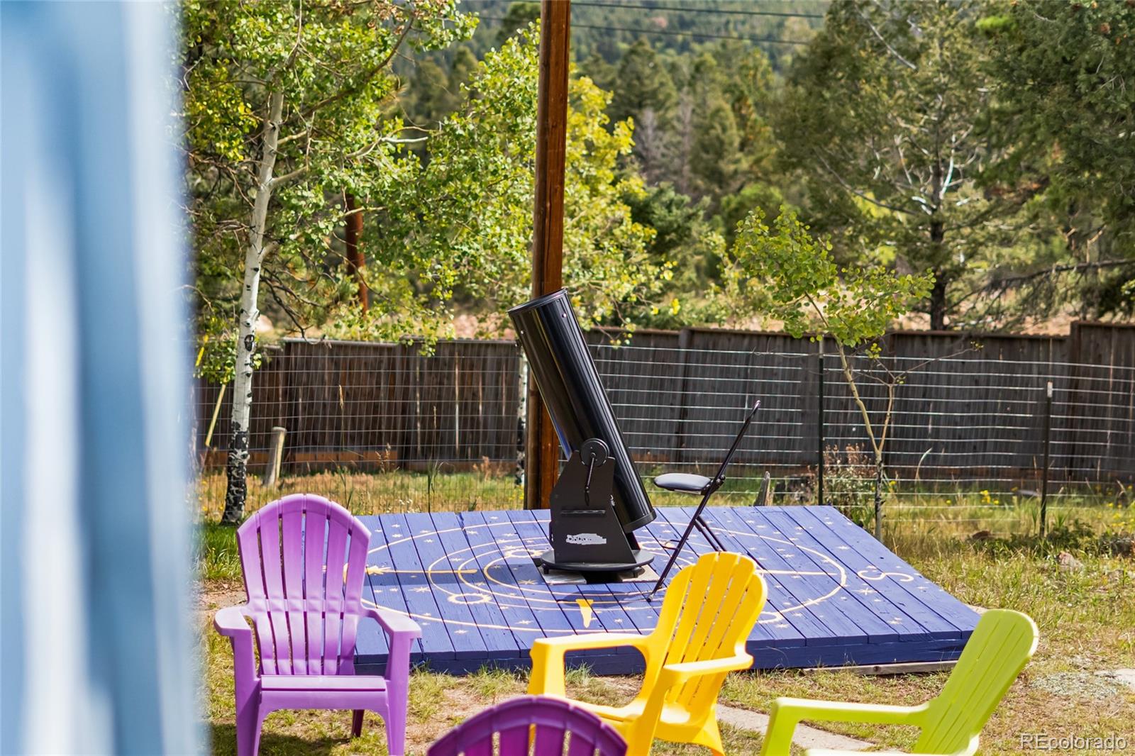 11948 Apache Trail Conifer, CO 80433 - Photo 28 of 45 a view of swimming pool with seating area