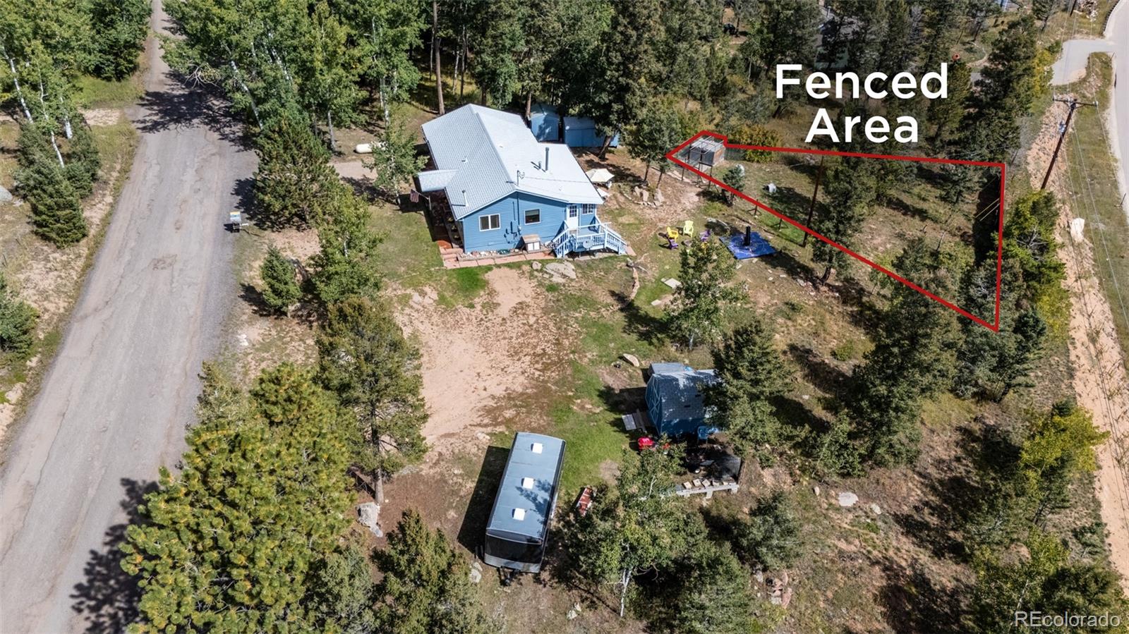 11948 Apache Trail Conifer, CO 80433 - Photo 35 of 45 an aerial view of a house with outdoor space and street view