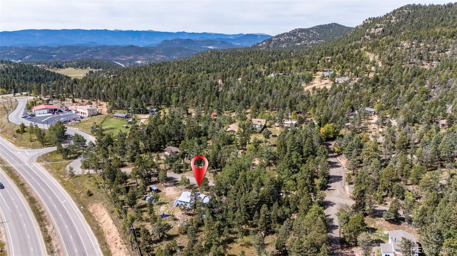 11948 Apache Trail Conifer, CO 80433 - Photo 39 of 45 a view of a city with a mountain