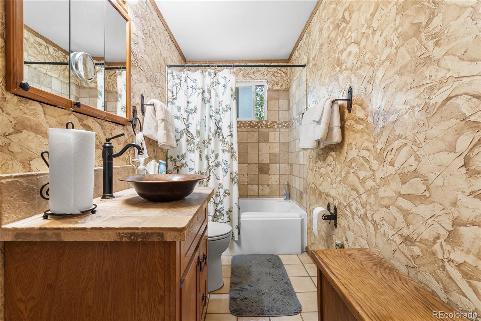 11948 Apache Trail Conifer, CO 80433 - Photo 9 of 45 a living room with furniture and a painting on the wall
