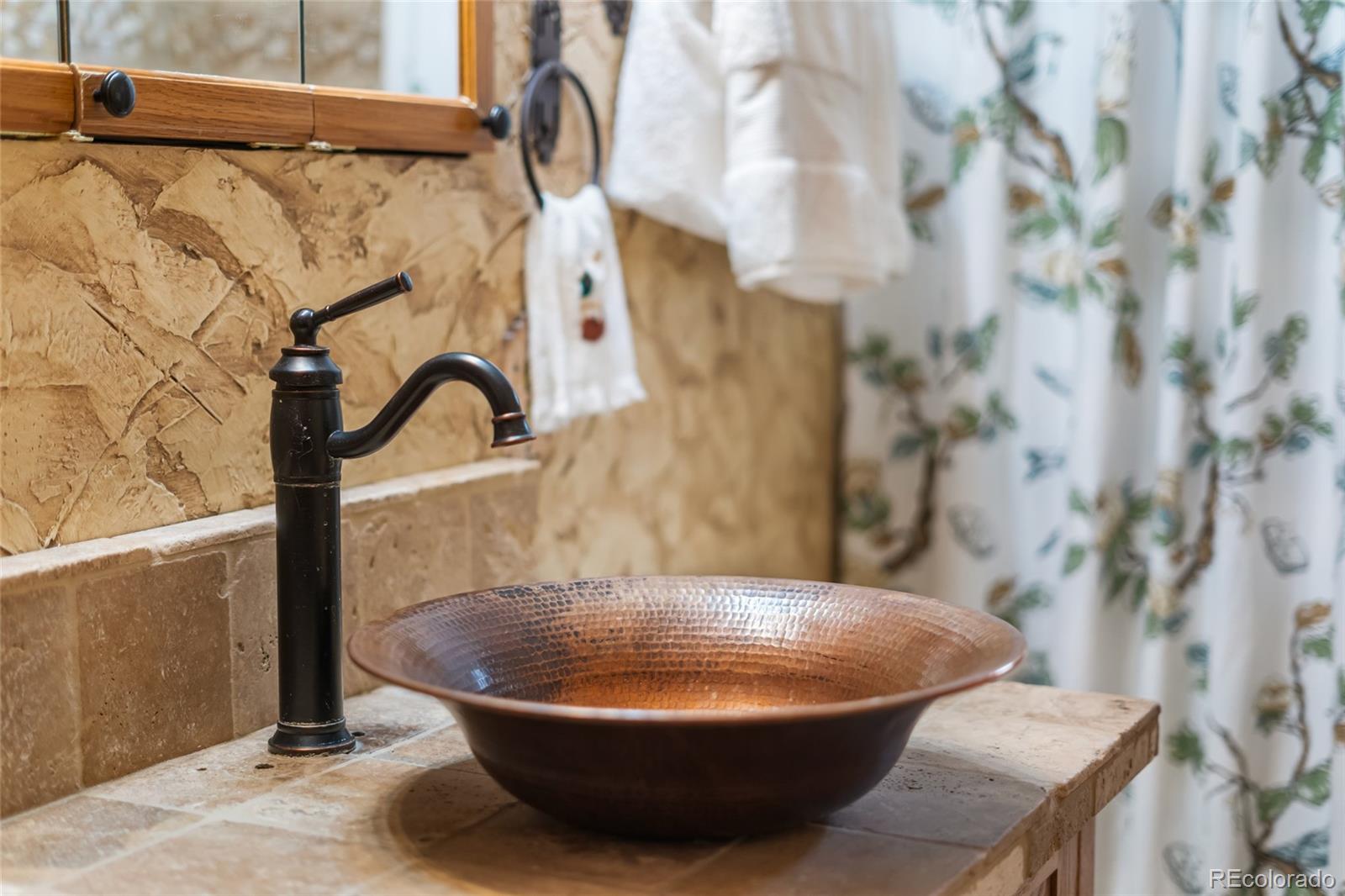 11948 Apache Trail Conifer, CO 80433 - Photo 10 of 45 a vase of flowers sitting on a table