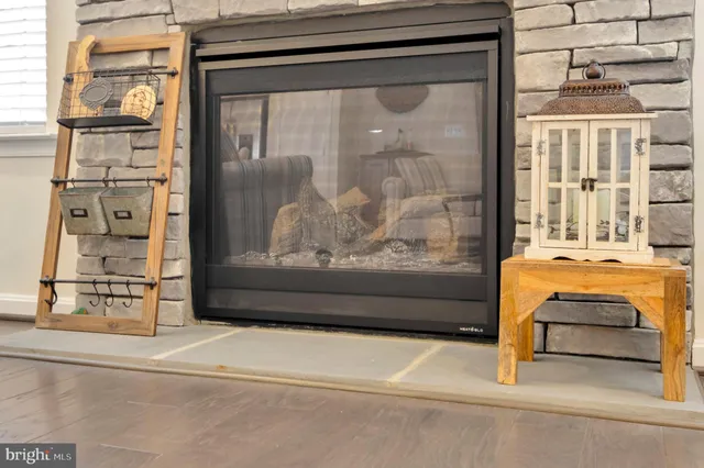 a kitchen with stainless steel appliances granite countertop a refrigerator sink and cabinets