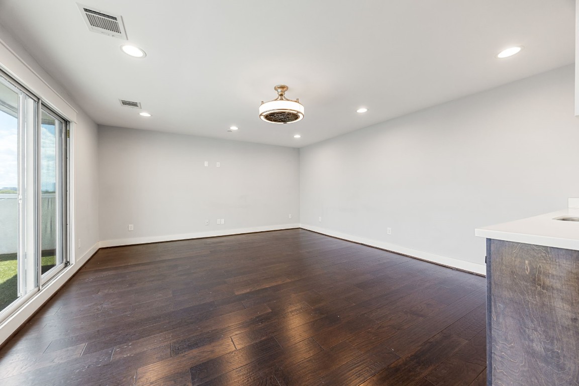 904 West 25th Street, Unit D Houston, TX 77008 - Photo 3 of 27 4th floor game room with sliding doors leading to the rooftop balcony and a wet bar - perfect for entertaining!