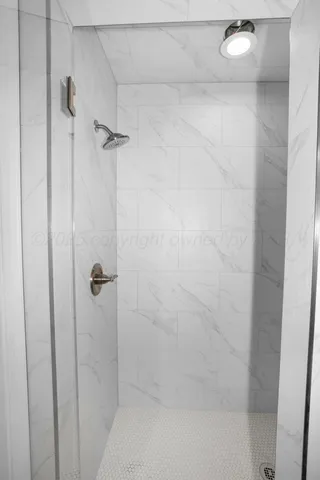 a bathroom with a bathtub