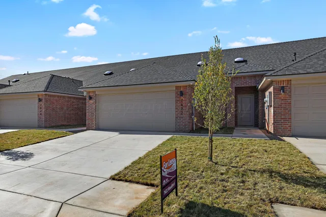 a house view with a backyard space