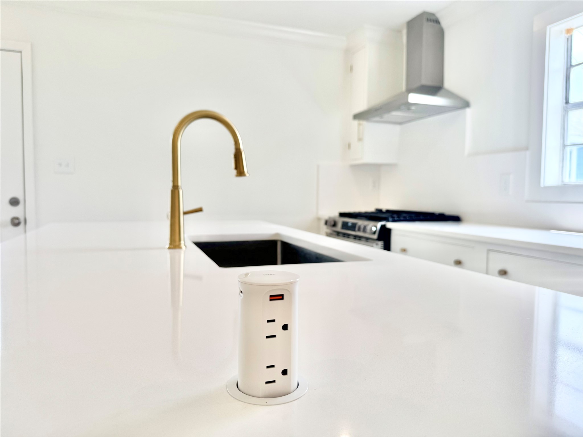1312 35th Street Galveston, TX 77550 - Photo 14 of 32 a close view of sink and tap