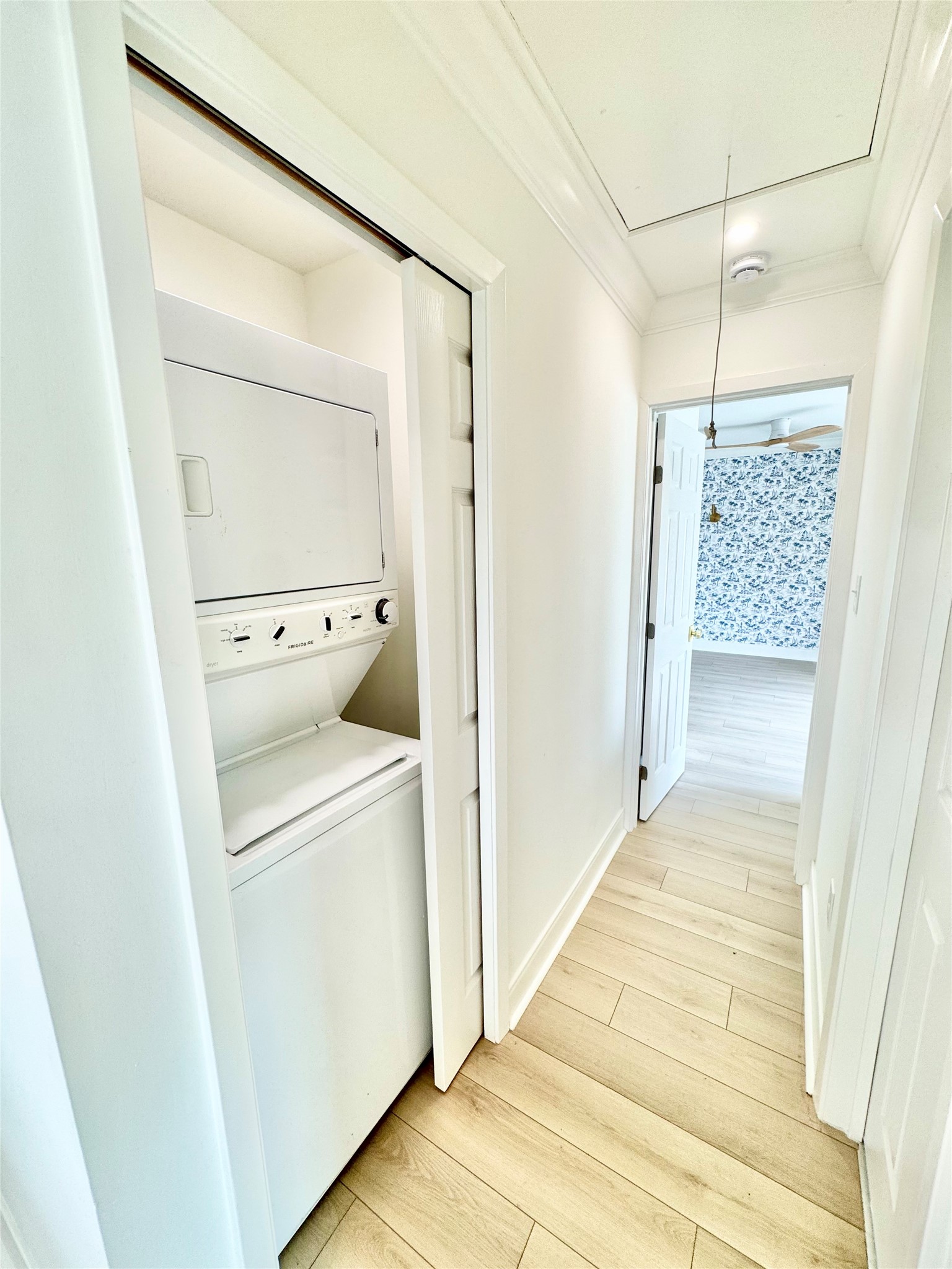 1312 35th Street Galveston, TX 77550 - Photo 15 of 32 a view of a storage & utility room with dryer and washer