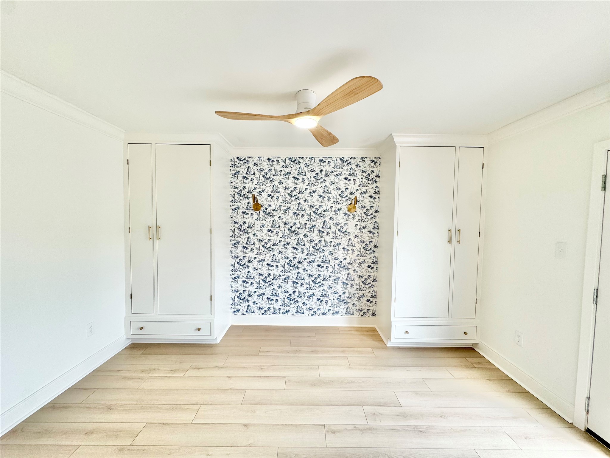 1312 35th Street Galveston, TX 77550 - Photo 18 of 32 a view of entryway with wooden floor