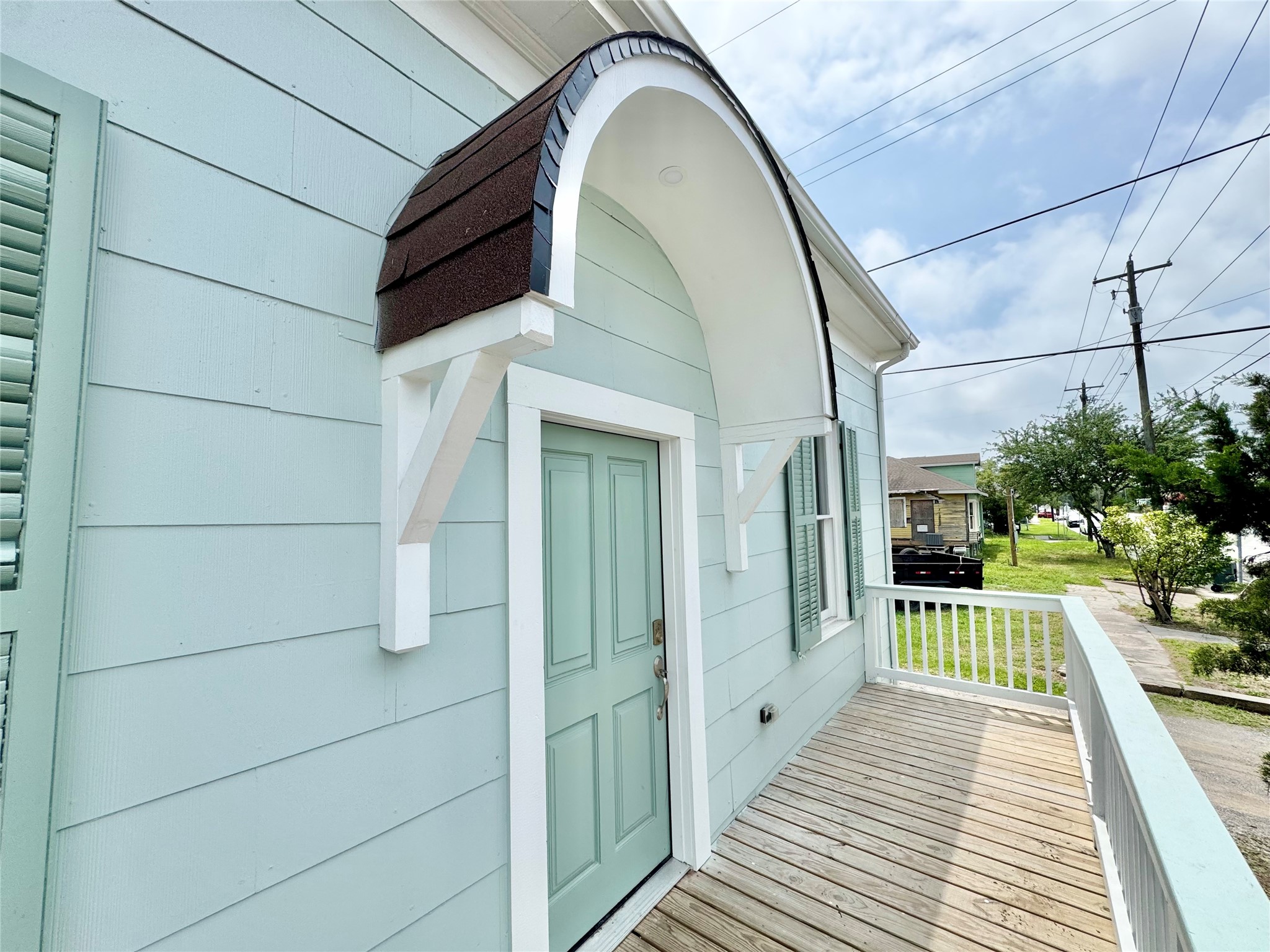 1312 35th Street Galveston, TX 77550 - Photo 3 of 32 a view of a house with a balcony