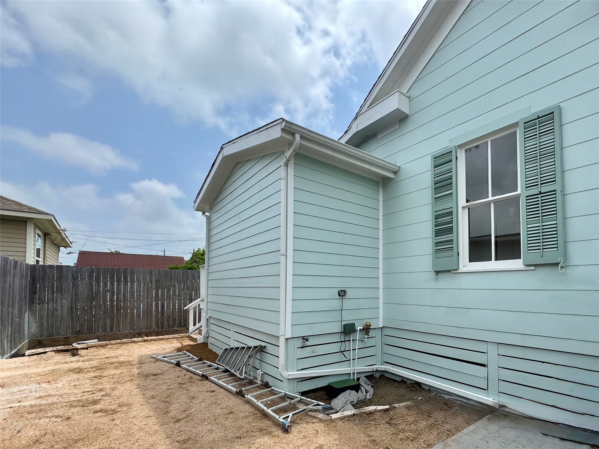 1312 35th Street Galveston, TX 77550 - Photo 31 of 32 a view of house with wooden fence