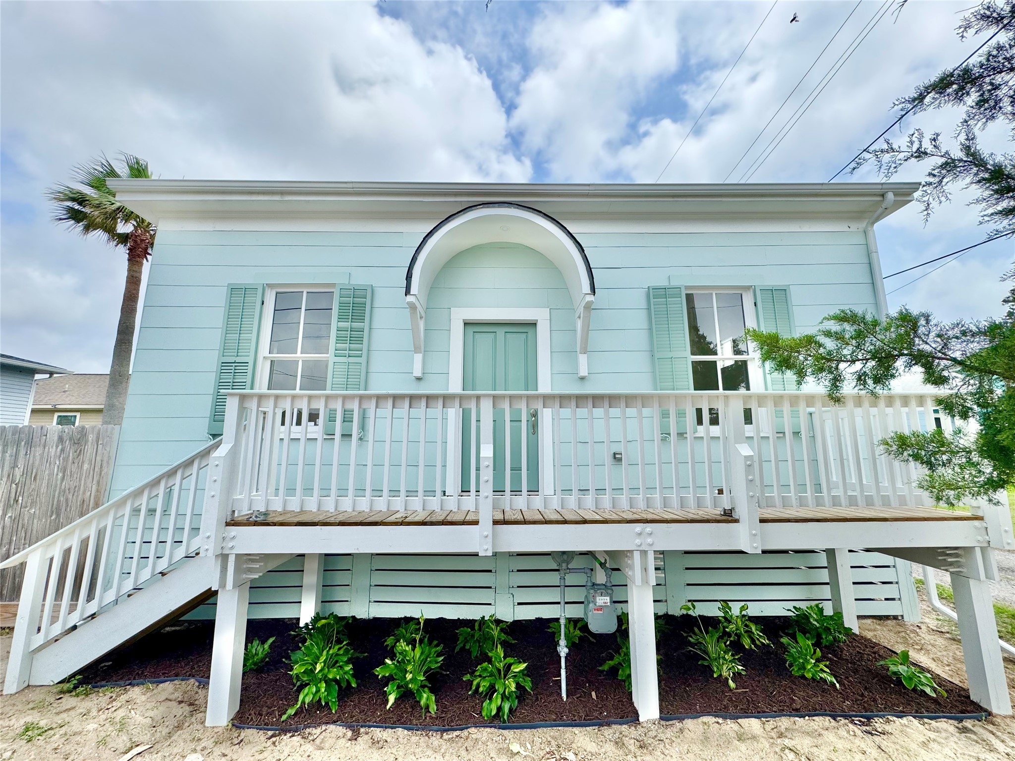 1312 35th Street Galveston, TX 77550 - Photo 32 of 32 a front view of a house with balcony
