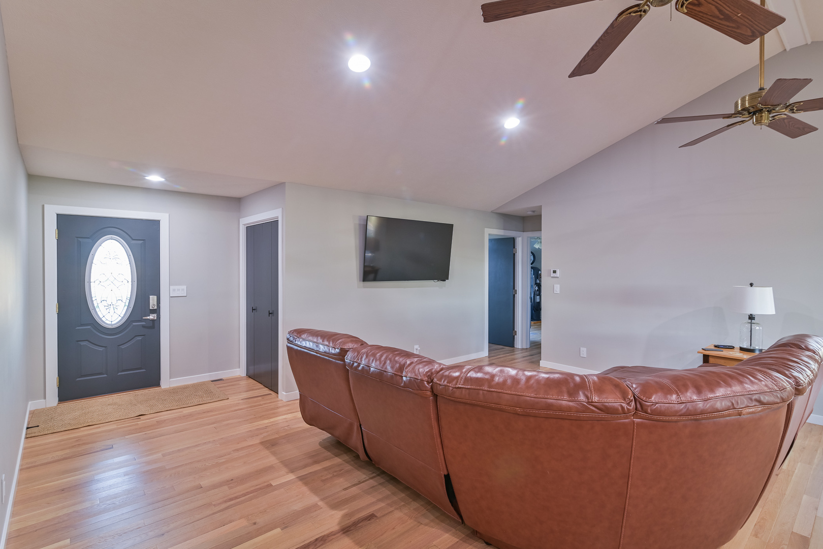 9220 Heritage Road Clinton, IL 61727 - Photo 11 of 37 a living room with furniture and a flat screen tv