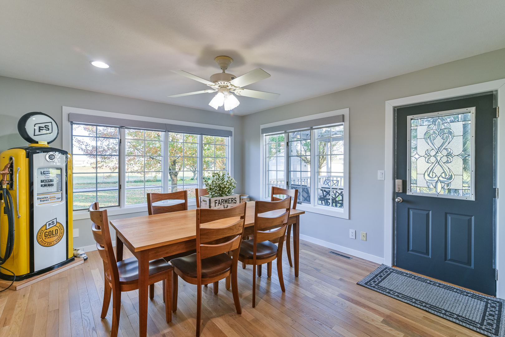 9220 Heritage Road Clinton, IL 61727 - Photo 16 of 37 a view of a dining room with furniture window and outside view