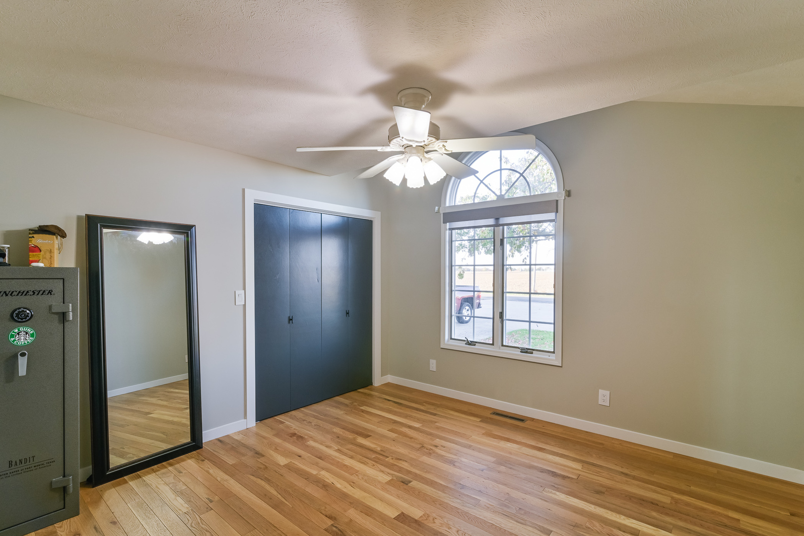9220 Heritage Road Clinton, IL 61727 - Photo 17 of 37 wooden floor and windows in a room