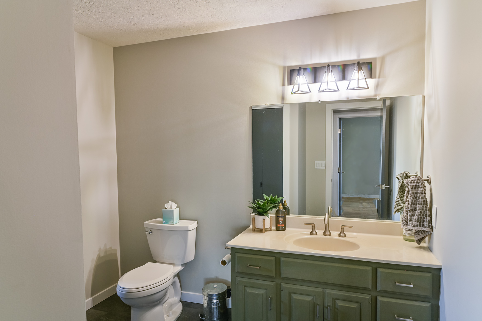 9220 Heritage Road Clinton, IL 61727 - Photo 18 of 37 a bathroom with a sink and a toilet