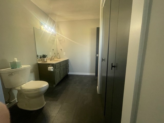 9220 Heritage Road Clinton, IL 61727 - Photo 19 of 37 a bathroom with a sink and a toilet