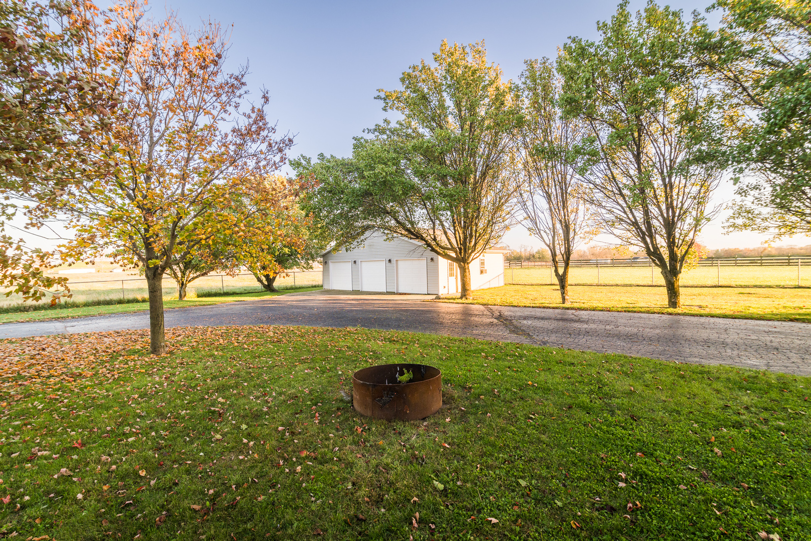 9220 Heritage Road Clinton, IL 61727 - Photo 6 of 37 a view of yard with tree and green space